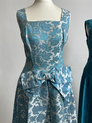 Lot 840 - Two 1960s evening gowns include one by Leanne of London  | in turquoise and brocade