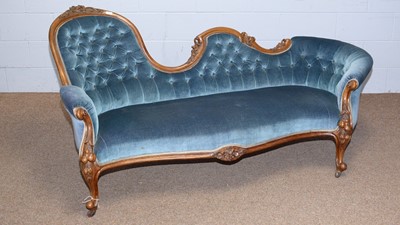 Lot 41 - A Victorian  carved walnut button back sofa.