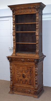 Lot 3 - A profusely carved North European 19th C oak bookcase cabinet.