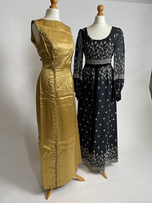 Lot 841 - A 1960s James Bond-style columnar evening gown and matching headband | and a 70s peasant dress