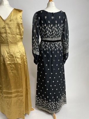 Lot 841 - A 1960s James Bond-style columnar evening gown and matching headband | and a 70s peasant dress