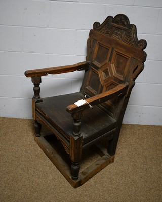 Lot 8 - A 17th Century style oak armchair.