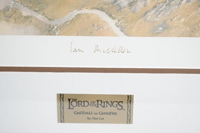 Lot 323 - After Alan Lee limited edition lithograph, Gandalf on Gwaihir over Helms Deep