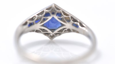 Lot 354 - A sapphire and diamond dress ring