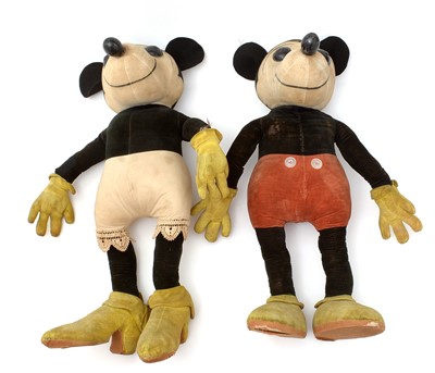 Lot 418 - A pair of large mid 20th Century Mickey Mouse felt toys.
