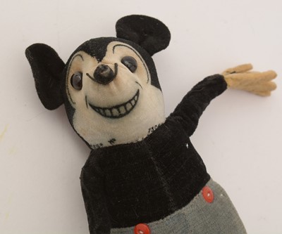 Lot 420 - A Walt Disney Productions Mickey Mouse felt soft toy.
