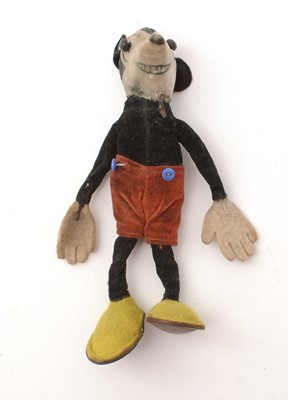 Lot 421 - A Walt Disney Productions Mickey Mouse felt soft toy.