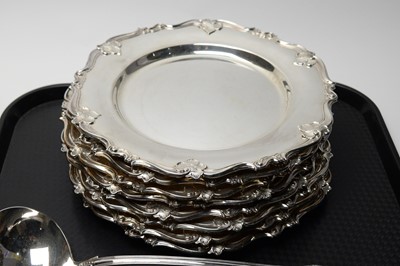 Lot 382 - A suite Mappin & Webb Kings pattern silver plated cutlery; and eight silver plated serving plates