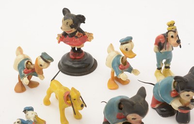 Lot 345 - A selection of Walt Disney figurines; and other related items.