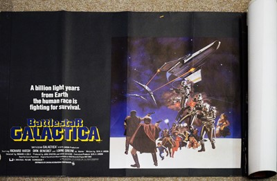 Lot 686 - Three British quad posters, Battlestar Galactica; and two others.