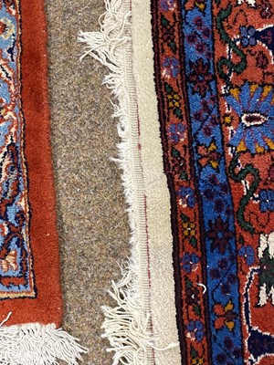 Lot 113 - A Saruk carpet.
