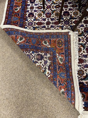 Lot 67 - A Saruk carpet.