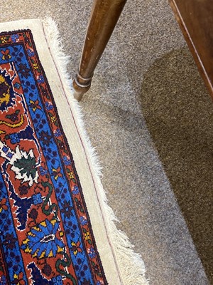 Lot 113 - A Saruk carpet.