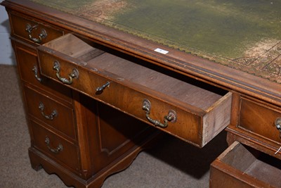 Lot 7 - A Georgian style reproduction mahogany pedestal desk.