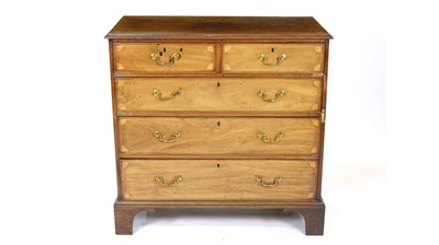 Lot 1353 - A George III mahogany and fan inlaid chest.