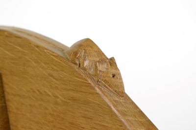 Lot 1265 - Workshop of  Robert ‘Mouseman’ Thompson (Kilburn): an oak book trough.