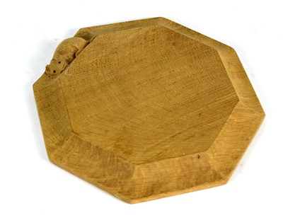 Lot 1266 - Workshop of Robert ‘Mouseman’ Thompson (Kilburn): an oak chopping board/teapot stand.