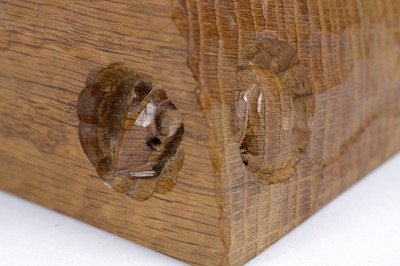 Lot 1267 - Workshop of  Robert ‘Mouseman’ Thompson (Kilburn): an unusual oak cheese wedge paperweight.