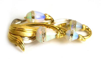 Lot 480 - An 18ct yellow and white gold, opal and rock crystal brooch