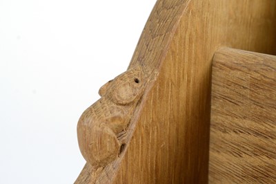 Lot 1269 - Workshop of  Robert ‘Mouseman’ Thompson (Kilburn): an oak stationery/letter rack.