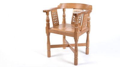 Lot 1280 - Workshop of Robert ‘Mouseman’ Thompson (Kilburn): an oak monk's chair.
