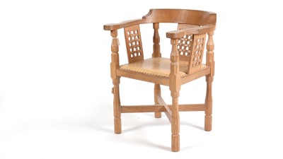 Lot 1281 - Workshop of Robert ‘Mouseman’ Thompson (Kilburn): an oak monk's chair.