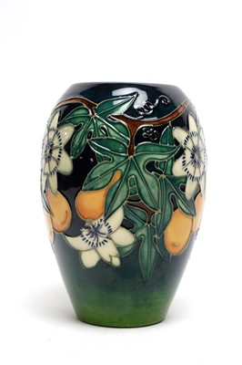 Lot 341 - A Moorcroft Passion Flower vase.