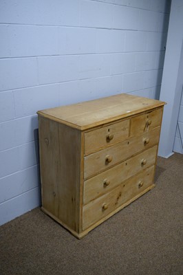 Lot 12 - A Victorian stripped pine chest.