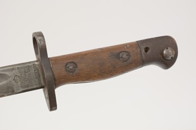 Lot 800 - A WWI British bayonet, and a WWII machete