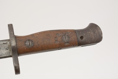 Lot 800 - A WWI British bayonet, and a WWII machete