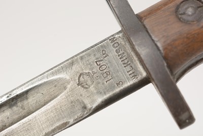 Lot 800 - A WWI British bayonet, and a WWII machete