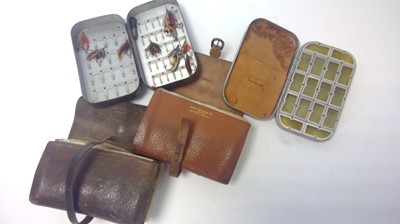 Lot 656 - A selection of North Eastern fishing reels and flies in cases
