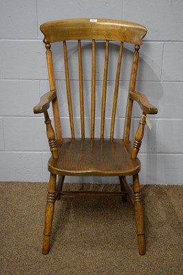 Lot 40 - A Victorian style elm and beech Windsor style armchair