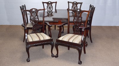 Lot 55 - An early 20th C mahogany extending dining table; and eight chairs.