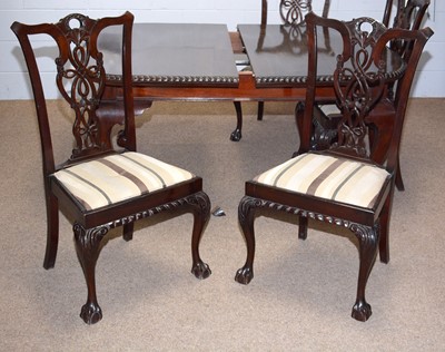 Lot 80 - An early 20th C mahogany extending dining table; and eight chairs.