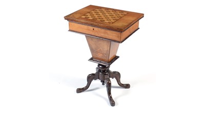 Lot 1354 - A Victorian Inlaid walnut games/work table.