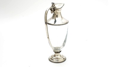Lot 553 - An Elizabeth II silver mounted glass claret jug, by Mappin & Webb