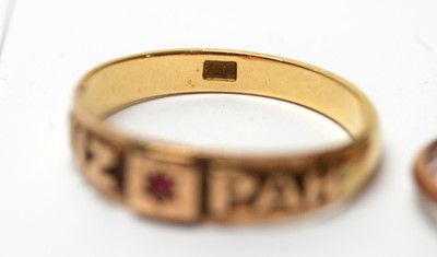 Lot 98 - A three stone garnet ring, and five other rings.