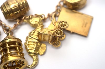 Lot 96 - A 9ct yellow gold charm bracelet