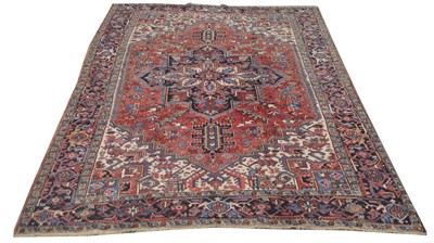 Lot 1107 - A Heriz carpet