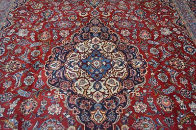 Lot 107 - A Kashan carpet