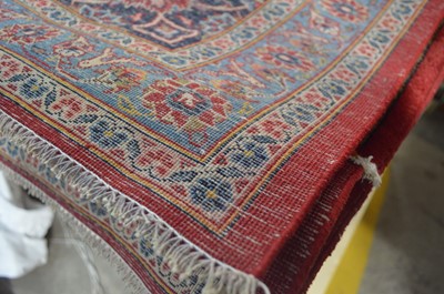 Lot 107 - A Kashan carpet