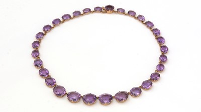 Lot 402 - An Edwardian style amethyst necklace