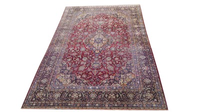 Lot 1132 - An antique pure silk Kashan carpet