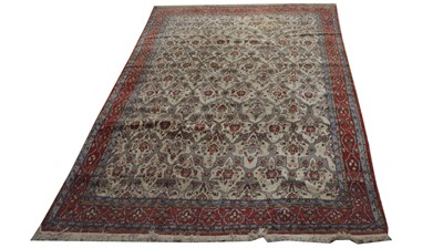 Lot 118 - A Ghom carpet