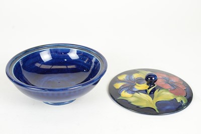 Lot 688 - Two Moorcroft Hibiscus pattern powder bowls and covers.