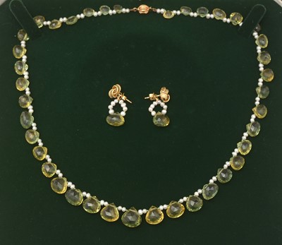 Lot 327 - A peridot and freshwater pearl necklace and earrings.