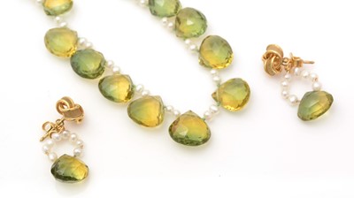 Lot 327 - A peridot and freshwater pearl necklace and earrings.
