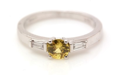 Lot 341 - A yellow sapphire and diamond ring