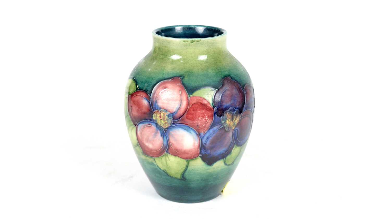 Lot 692 - Moorcroft Clematis pattern vase
